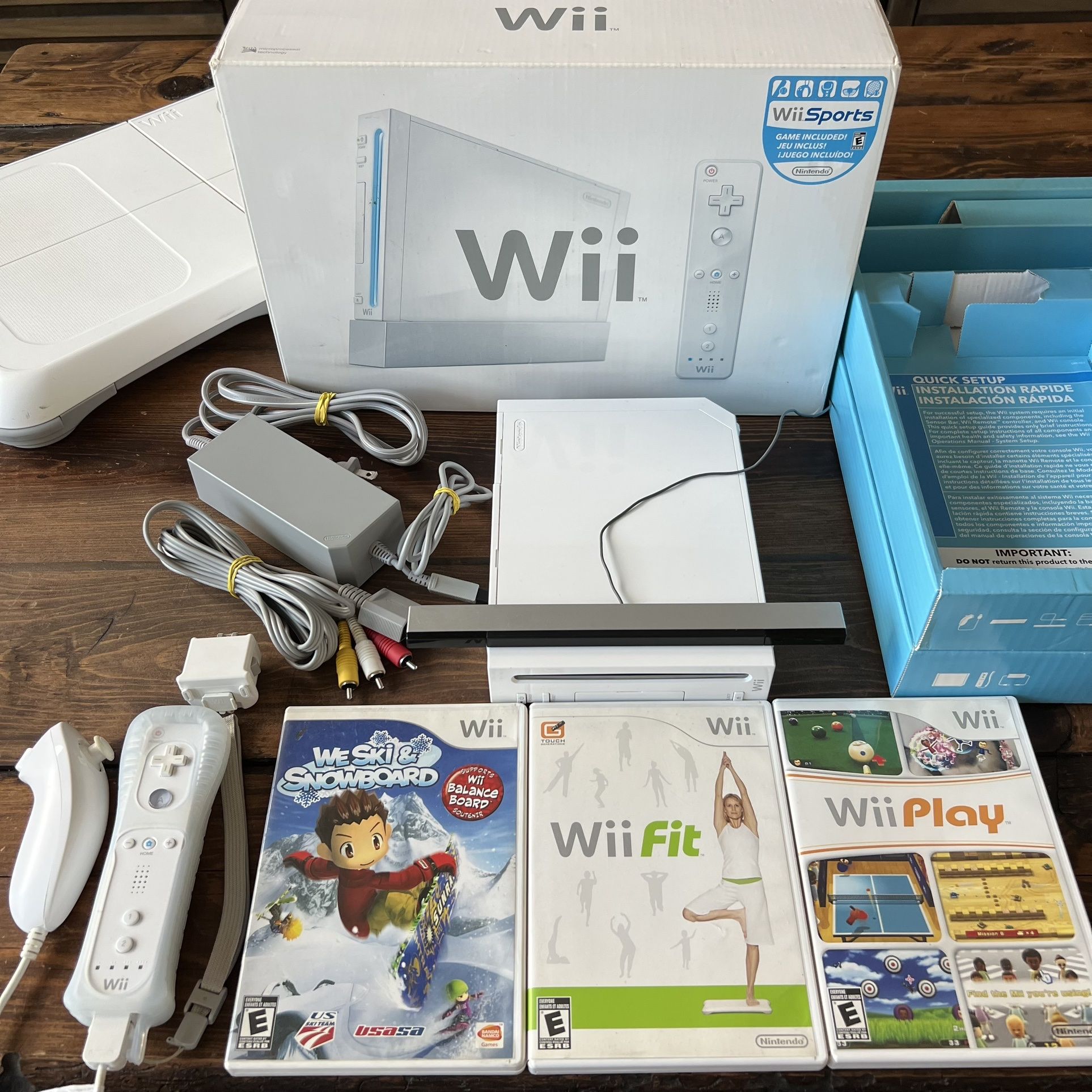 Nintendo Wii. With Wii Motion Plus Remote & 39 Virtual Console