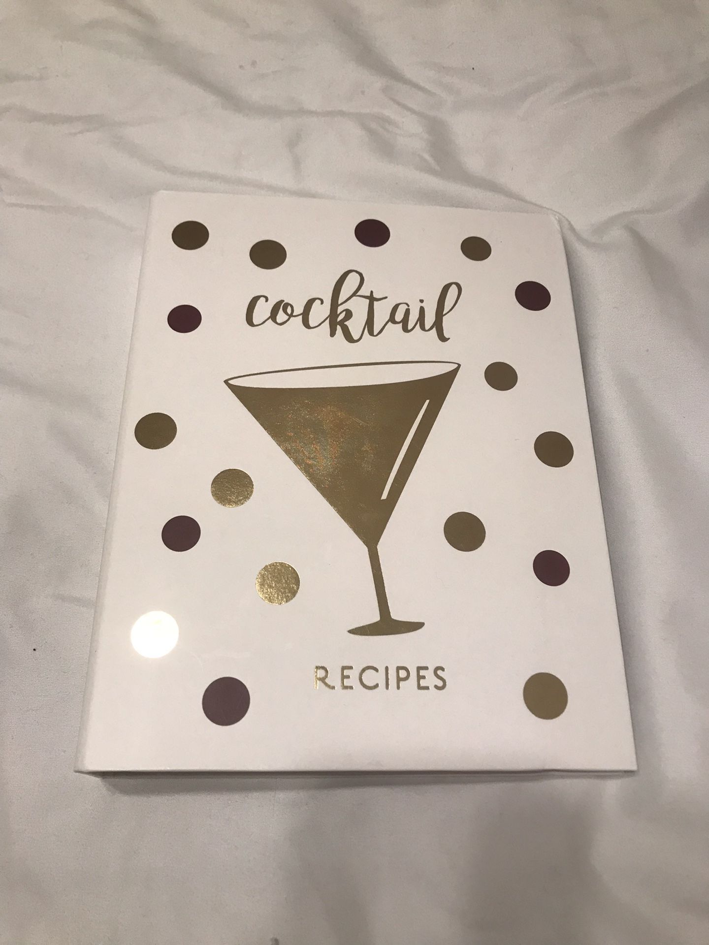 Cocktail book, stirrers and napkins