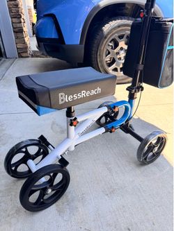 KNEE Scooter.  Plush Seat pad, left /ride side Brake Handles. 300lb. Weight Limit. New.