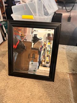 Black framed mirror