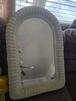 Mirror with white wicker edges