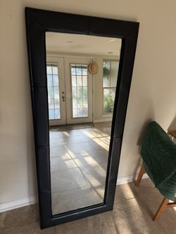 Floor mirror with leather border