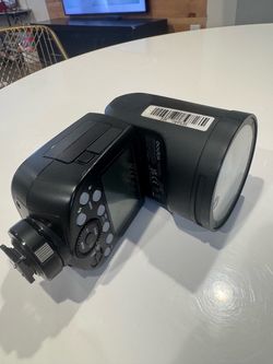 Godox V1 round-head TTL speedlight flash- $125