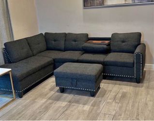 Charcoal linen sectional couch and ottoman