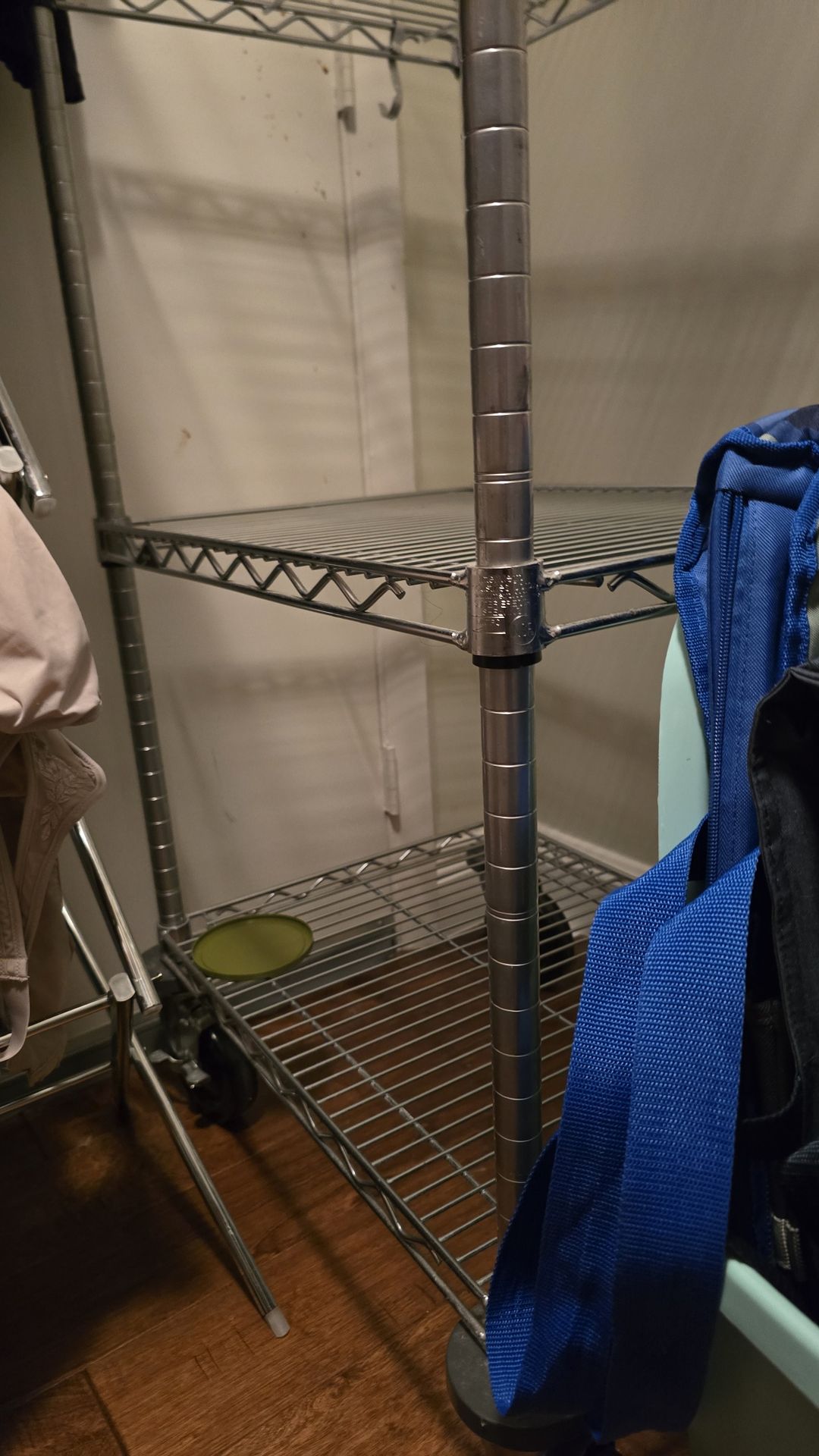 Metal shelving unit on wheels