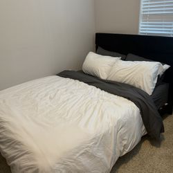 Black Full Sized Bed And Head Board.