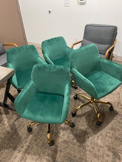 Plush Emerald Green Swivel Chairs