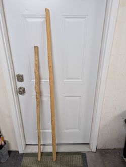 Two Wood Carved Walking Sticks