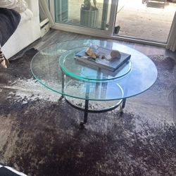 Glass Coffee Table. Modern With Silver. Rolls.