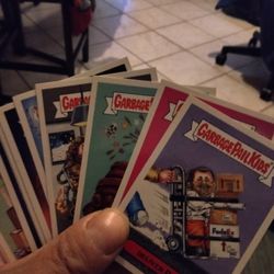 A Stack Of Garbage Pail Kids Cards 