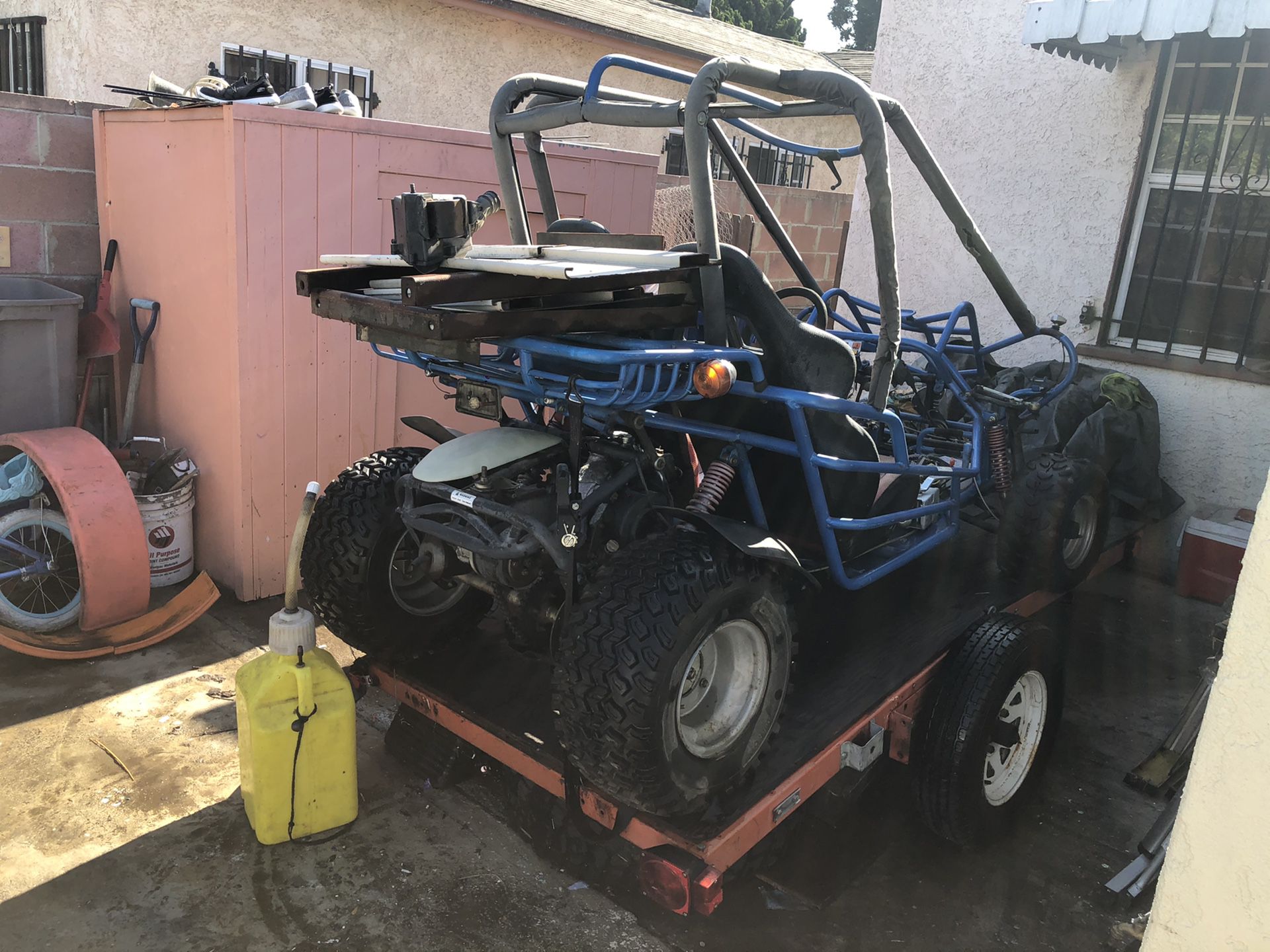 go kart for adults 150cc 2 seater it fun for off-roading or to be in farms $1300 it comes with a trailer lmk when ur ready to pick up or trade for a