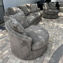 Ashley Furniture. Beautiful sofa that converts into a bed and two swivel chairs. I can deliver for an additional cost. 