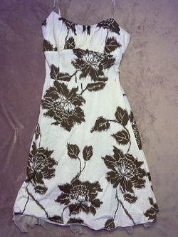 Cream and brown floral print babydoll dress with ruffles at the bottom #fairycore #cottagecore