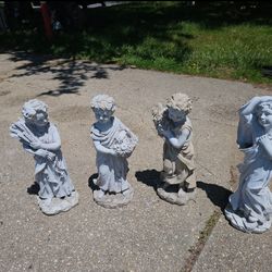 Price Is Firm.. Four Beautiful Garden Statues