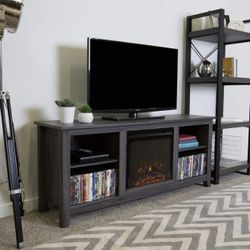 Electric Fireplace Tv Stand New in Original Packaging Accommodating Tv’s Up To 65” Stunning Crystal LED Pebbles. 