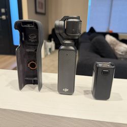 DJI OSMO POCKET 3 + Battery Handle + Storage Case