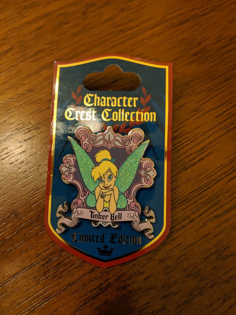 Disney character crest collection limited edition pin with Tinkerbell. Pin number 2 of 12 limited edition 1500