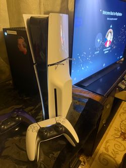 PS5 Slime with disc drive and PlayStation Portal black