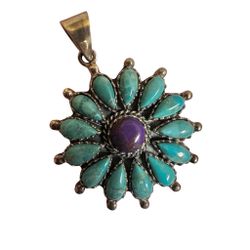 sterling silver  Stamped TAU  turquoise and purple center  flower pendant
