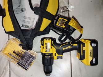 DeWalt drill with 5ah battery and charger with bits