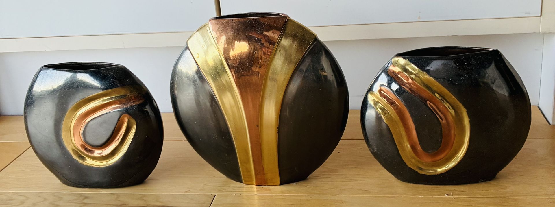 3 Flower Vases, Solid Brass, Center Vase 7 1/2” HighX7 1/2” Wide, 2 Side Vases 5 1/2” HighX6”wide.