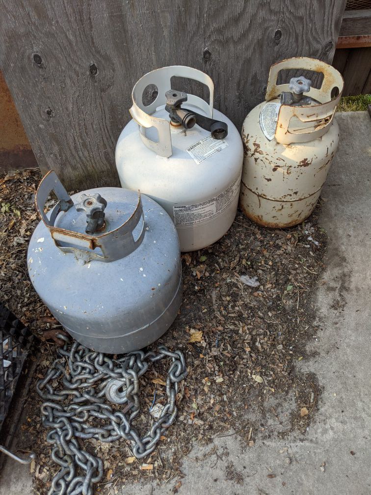 Three propane tanks empty
