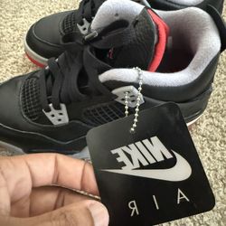 Size 5.5 Jordan 4s Bred Gs