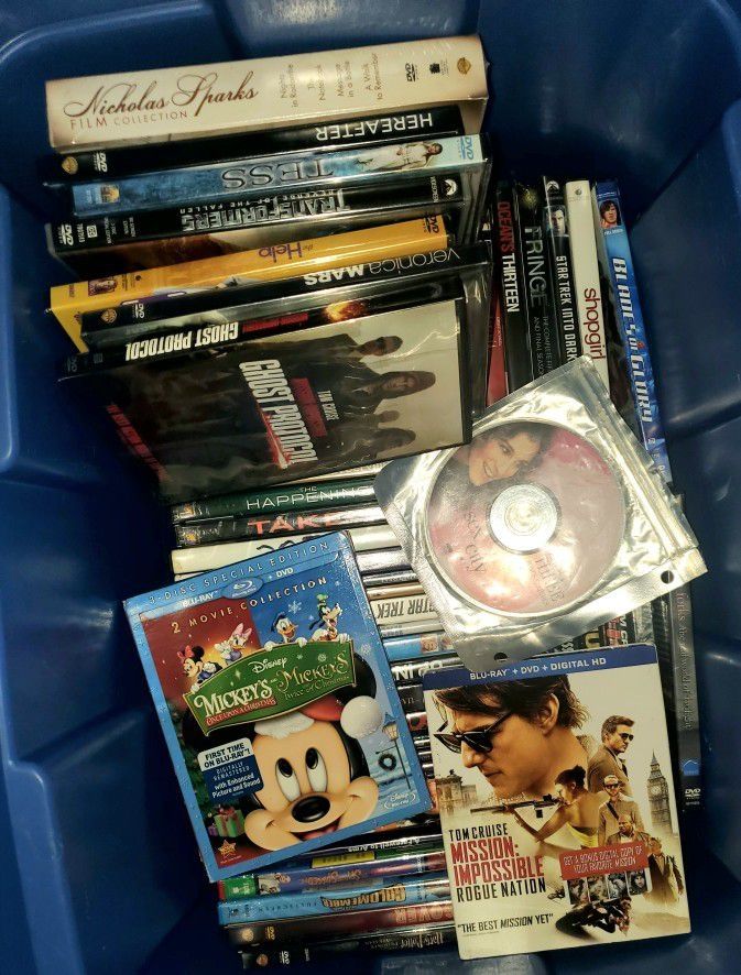 Over 50 DVD's Movies/Shows Some Never Opened