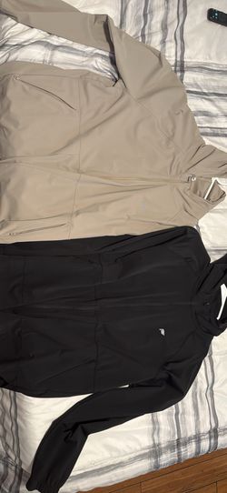 Men’s Fabletics, rain jacket size large and medium