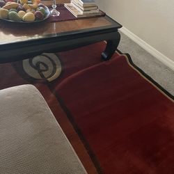 Red rug with design