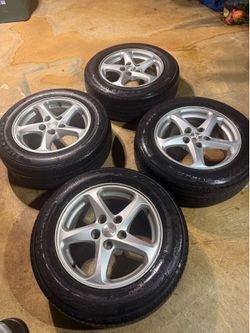 5 Lug wheels w\ firestone tires
