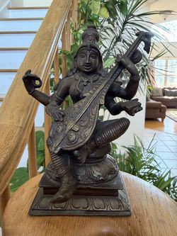 7” brass sculpture of Sarasvati (goddess of education )