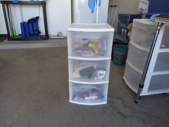 3 Drawer Plastic Storage Tower With Miscellaneous Items In All Drawers