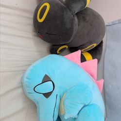 Sleeping Umbreon and Totodile Plush