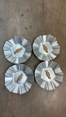 OEM Chevy High country center caps (scratches on them) $45 EACH/CADA UNA