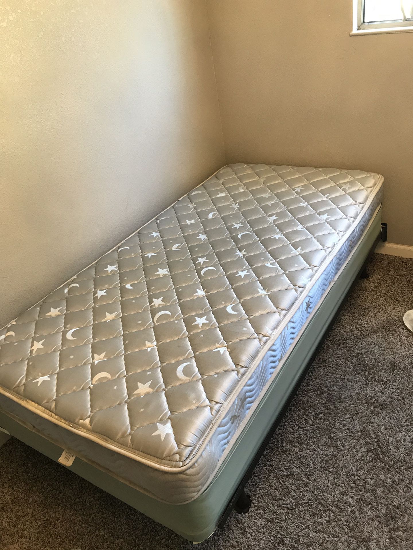 Twin bed with mattress box springs and frame good condition