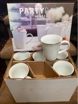 Gold banded dinner plates with matching Mugs for $18/box of 12