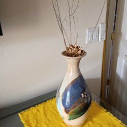 vase glazed finish  blue/green hues 15 5 height 7.5 width 10.00