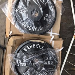 Brand New Pair Of 35 Olympic Cast Iron Plates