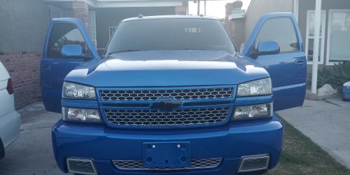 Silverado blue drip 20% two front windows windshield