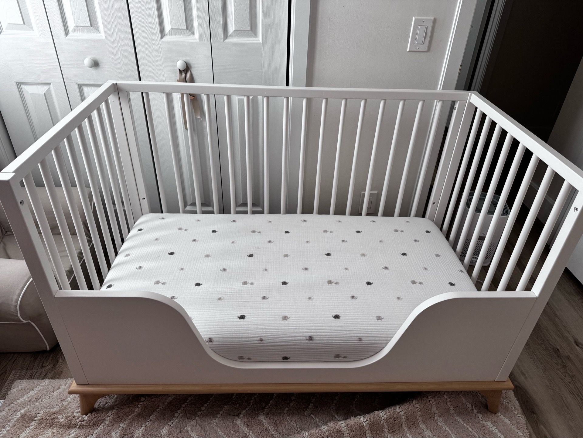 Pottery Barn Sydney crib, conversion guardrail kit, and Organic Naturepedic crib Mattress