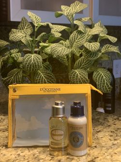 L’Occitane in Provence pouch w/ oil & body cream