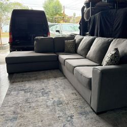 Light Gray Living Spaces Sectional Sofa with Left-Facing Chaise