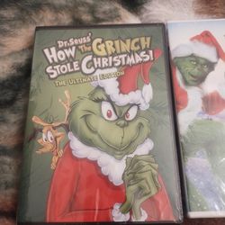 Brand new never opened two Grinch DVD movies the cartoon and the movie both $20 bucks pick up only 