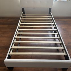 White Twin sized bed(Mattress Not Included)