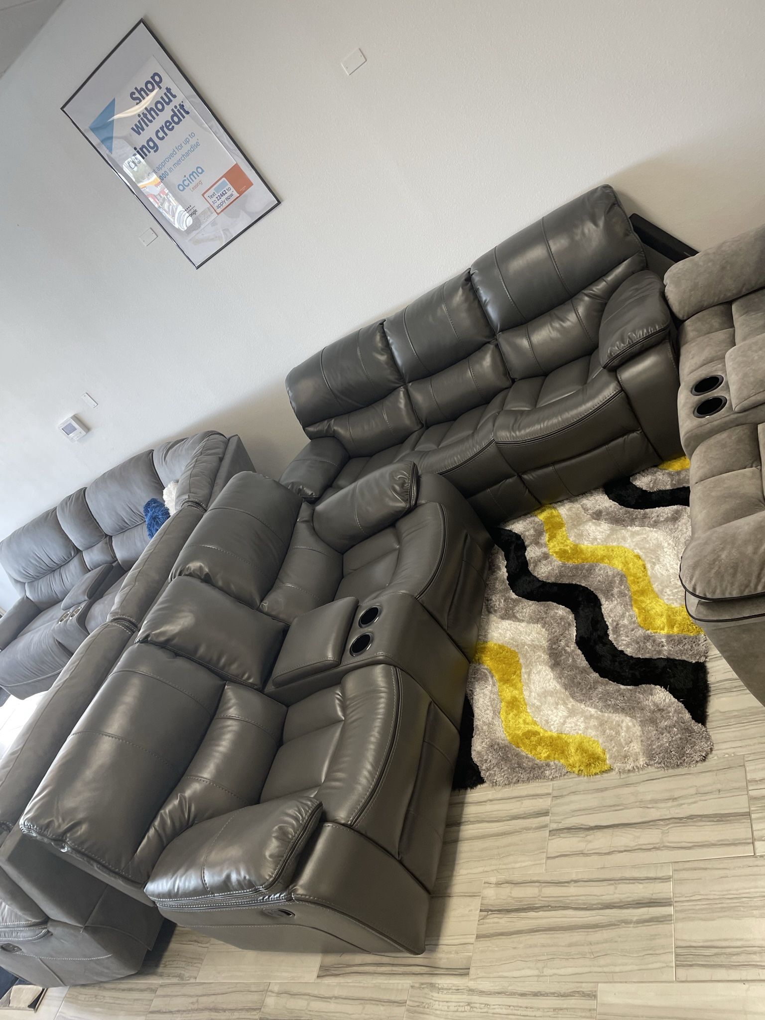 Holiday sale. Madrid, gray leather reclining sofa and loveseat set only $1299. Easy finance option. Same day delivery.