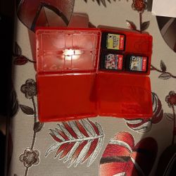 Nintendo Switch™ Lite - Coral And Three Game  With Case Included
