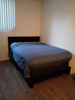 Refurbished mattress with frame and headboard