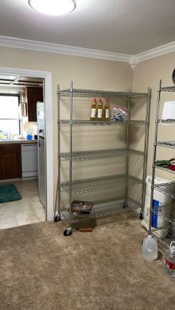Metal racks with caster wheels.