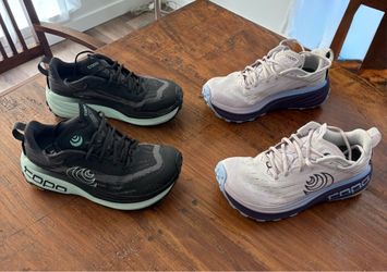 2 pairs women’s 8 Topo athletic shoes